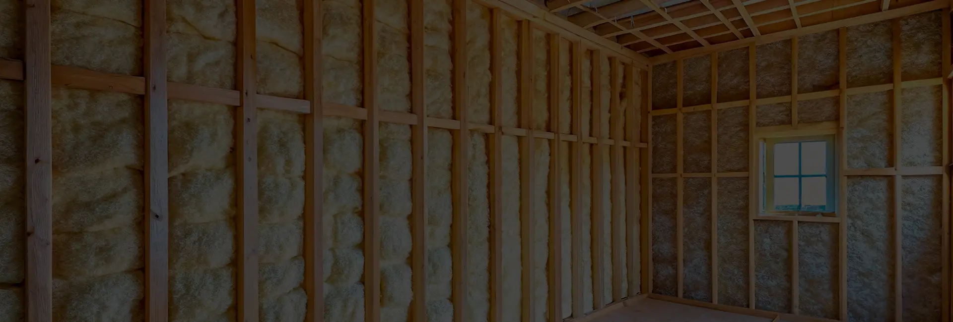 Framed walls filled with spray foam insulation, before drywall