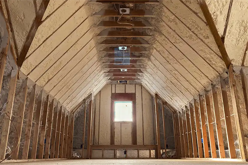 A residential attic fully sealed with Sebastian Spray Foam closed-cell spray foam insulation