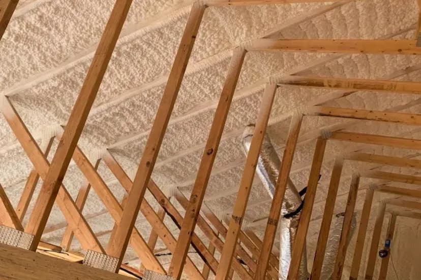 Insulated roof deck between the rafters