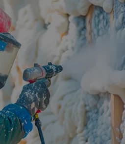 Open-cell spray foam expanding to fill a wall cavity