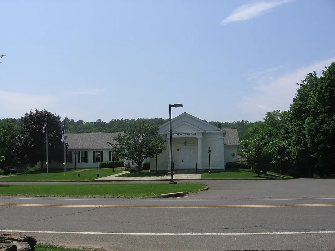 The white colonial Roxbury Town Hall on a summer day in Roxbury, Connecticut