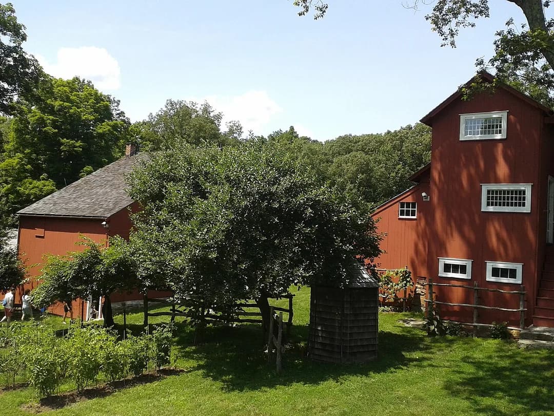 The historic red studios and barns at Weir Farm National Historical Park in Wilton, Connecticut